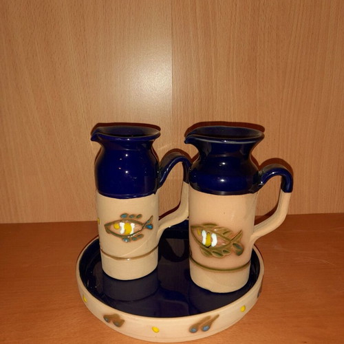 Traditional clay jugs with tray like new