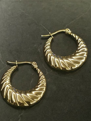 Stainless Steel Earrings like new, gold tone, unique hoop design