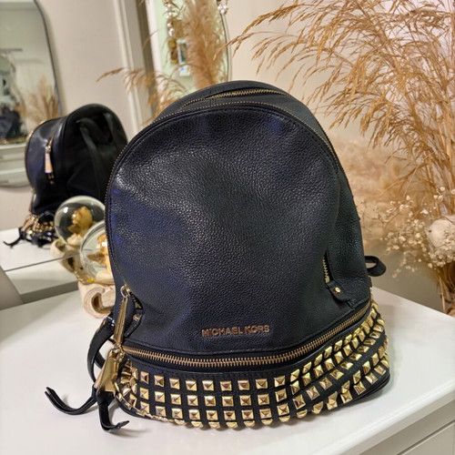 Michael Kors leather backpack used with broken zipper black