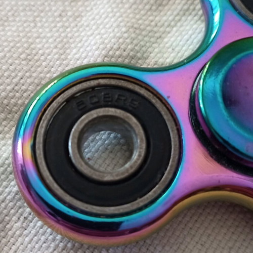 Fidget toy iridescent metal like new