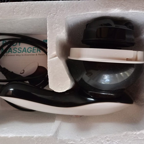 Body Massager new with multiple heads and heel attachment