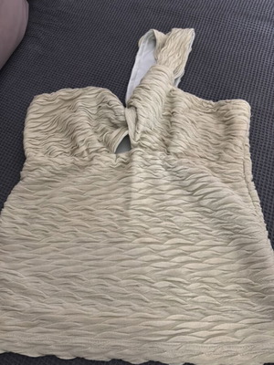 Pistachio one-shoulder blouse in crinkled fabric like new