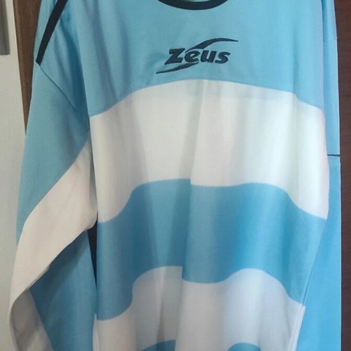 Zeus sportswear medium like new, white and turquoise