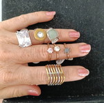 10 jewelry pieces in gold and silver tones