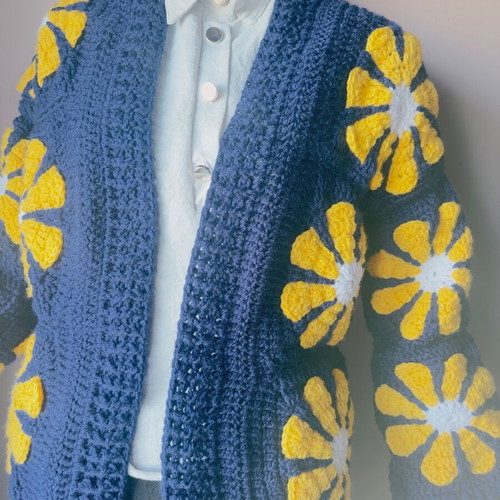 Handmade crochet cardigan made to order with daisies in blue and yellow