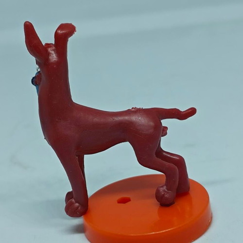 Vintage dog figure like new with orange base
