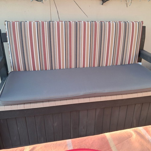 Outdoor bench with storage, like new, cushions included