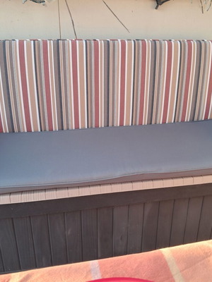 Outdoor bench with storage, like new, cushions included