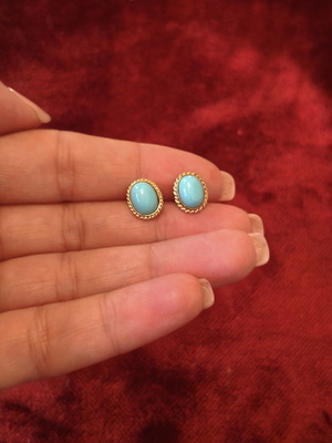 Stud earrings with oval turquoise stone used, gold tone