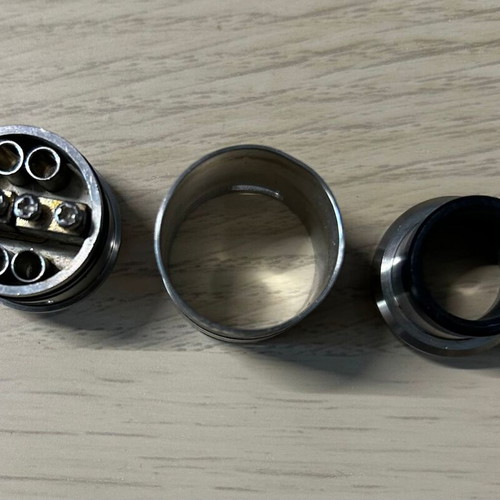 Phenom Vaporizers The Reckless RDA used, stainless steel