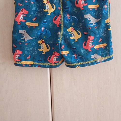 Tortue Kids' Swimwear with Dinosaur Design like new, size 104 cm