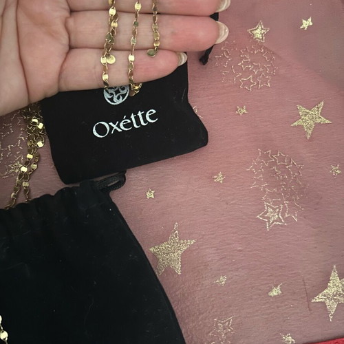 Oxette jewelry set like new, gold necklace and earrings