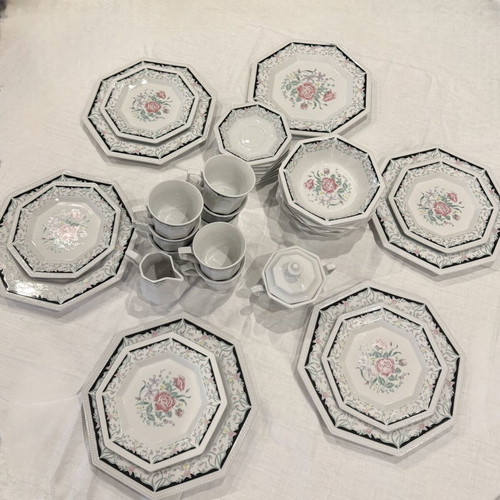 Vintage porcelain 37-piece dinnerware set with floral design