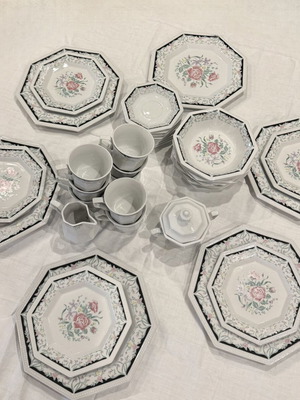 Vintage porcelain 37-piece dinnerware set with floral design