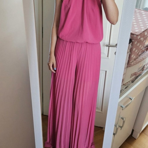 Zini Boutique pleated backless jumpsuit with gold chain, size L