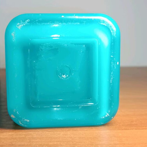 Soap dispenser and toothbrush holder used
