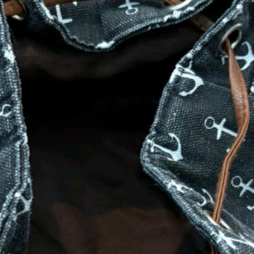 Backpack with anchor design and leather details like new
