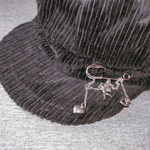 Black corduroy cap with silver safety pin new