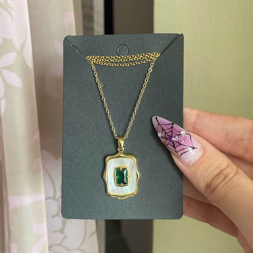 Necklace new steel with green stone