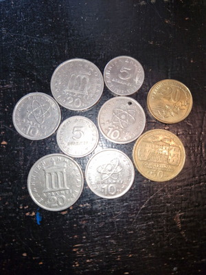 Coins from Around the World used, including Greek and US cents