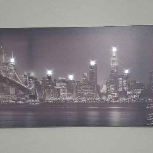 Fabric wall art with purple grey shades and LED lights