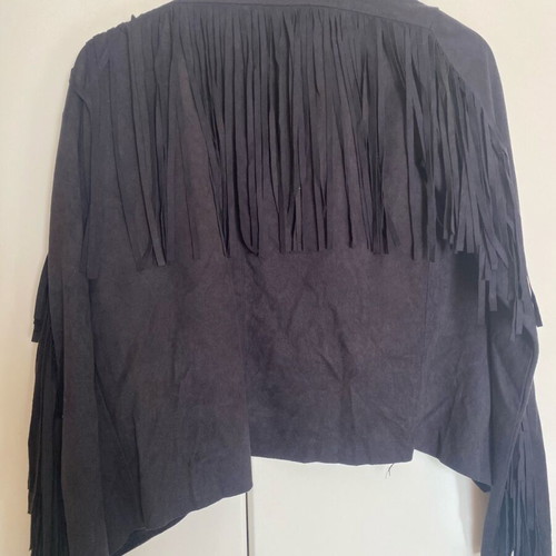 Women's short jacket used with fringes and castor texture