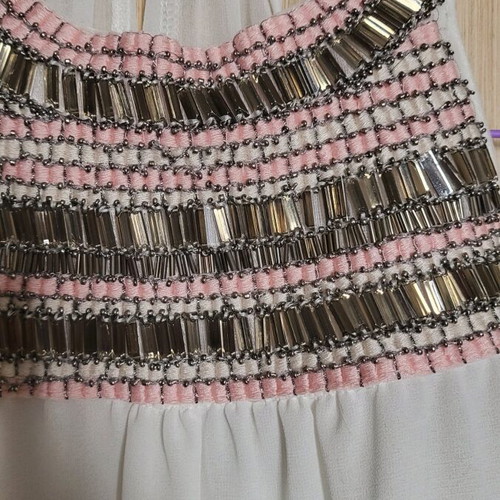 Women's top with sequins used, white with pink embroidery, size M
