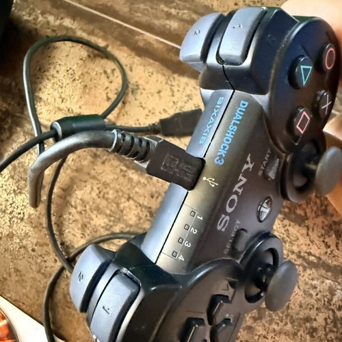 PlayStation 3 controller used with GTAV, Killzone 2, Heroes over Europe games