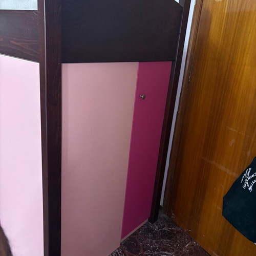 Loft bed used with storage cabinets and hidden desk