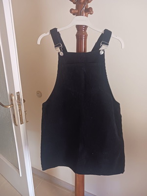 Black corduroy salopette with front and side pockets