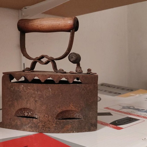 Antique iron used, coal-heated, 100 years old