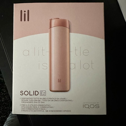 Solid IQOS device used with wear