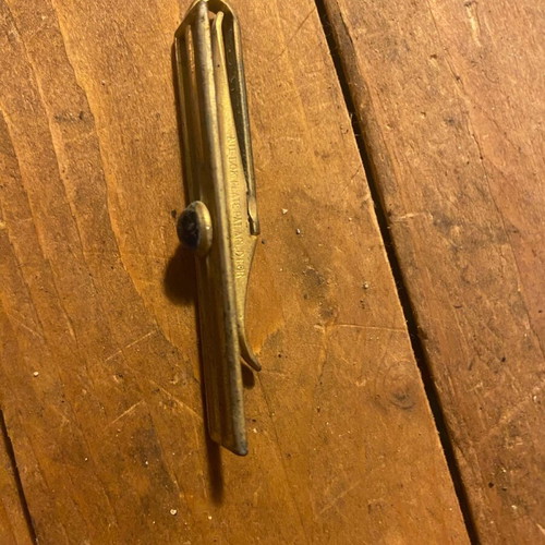 Metal tie clip used, gold color, 6 cm length
