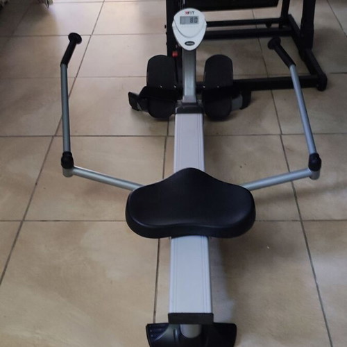 Elliptical rowing machine with adjustable training bench like new