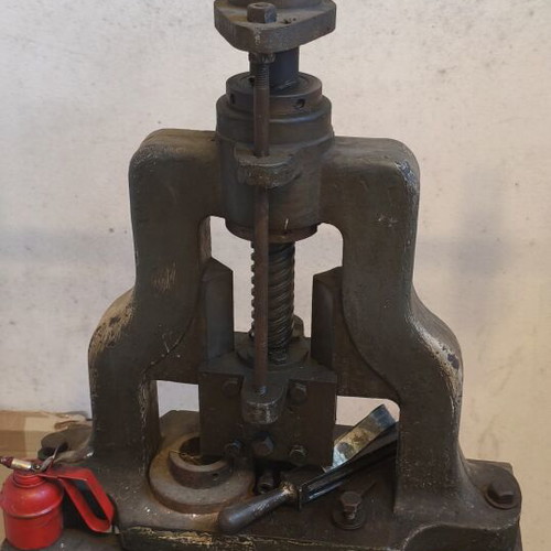 Manual Cast Iron Jewelry Press used with sturdy iron base