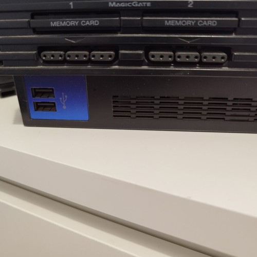 PlayStation 2 Fat console used with 2 controllers, memory card and 21 games