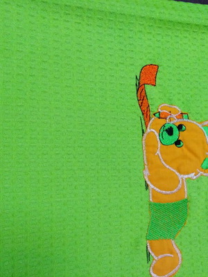 Baby blanket piqué with green teddy bear applique 1.14x1.30