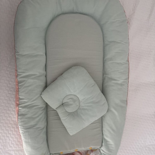 Baby nest with pillow used