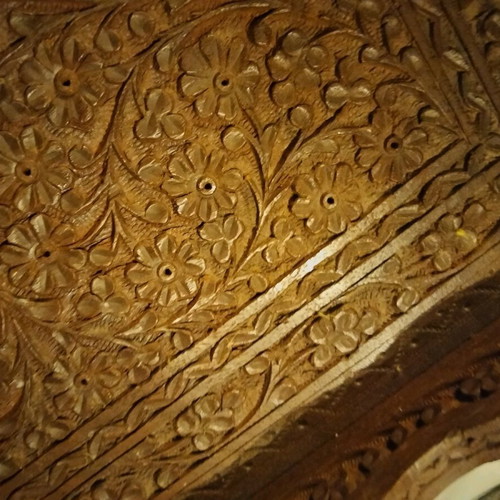 Carved wooden tray used with brass inlay