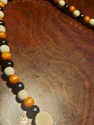 Handmade necklace with wooden medium and small discs, length 57 cm