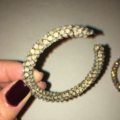 Swarovski stones used, large bronze hoop earrings with one missing stone