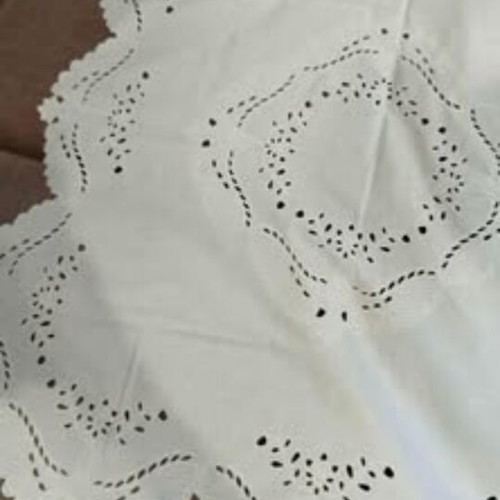 Embroidered square table linen with machine embroidery