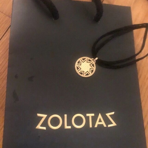 Aeolos Zolotas 2018 pendant like new, collectible, gold color