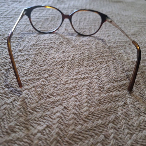 Women's eyeglass frame used, brown and gold