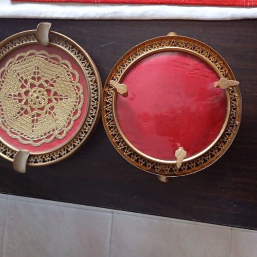 Vintage ashtrays used, ornate design