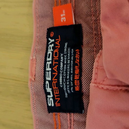 SuperDry men's pink bermuda shorts used, above the knee with buttons