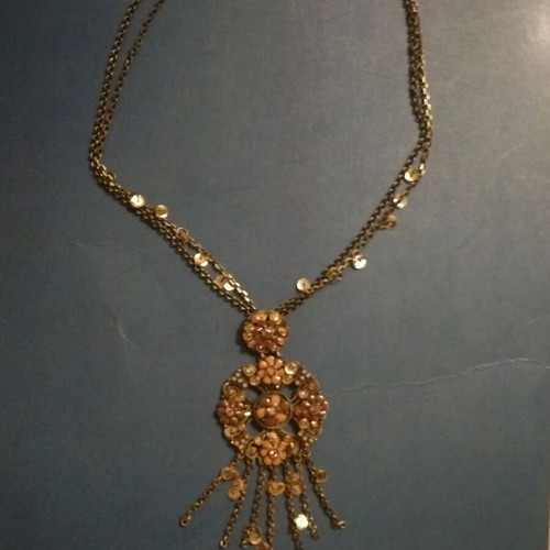 Boho style bronze pendant like new with sequins and beads