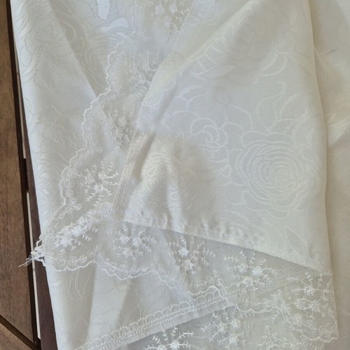 White floral tablecloth with delicate lace edges like new