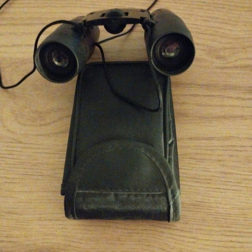 Binoculars like new with case, unused
