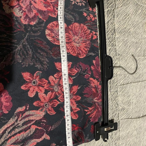 Set of two pencil skirts used, black and white and floral